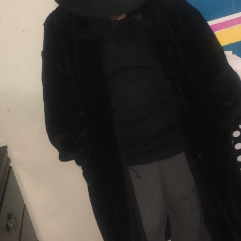 Long reversible black faux fur coat